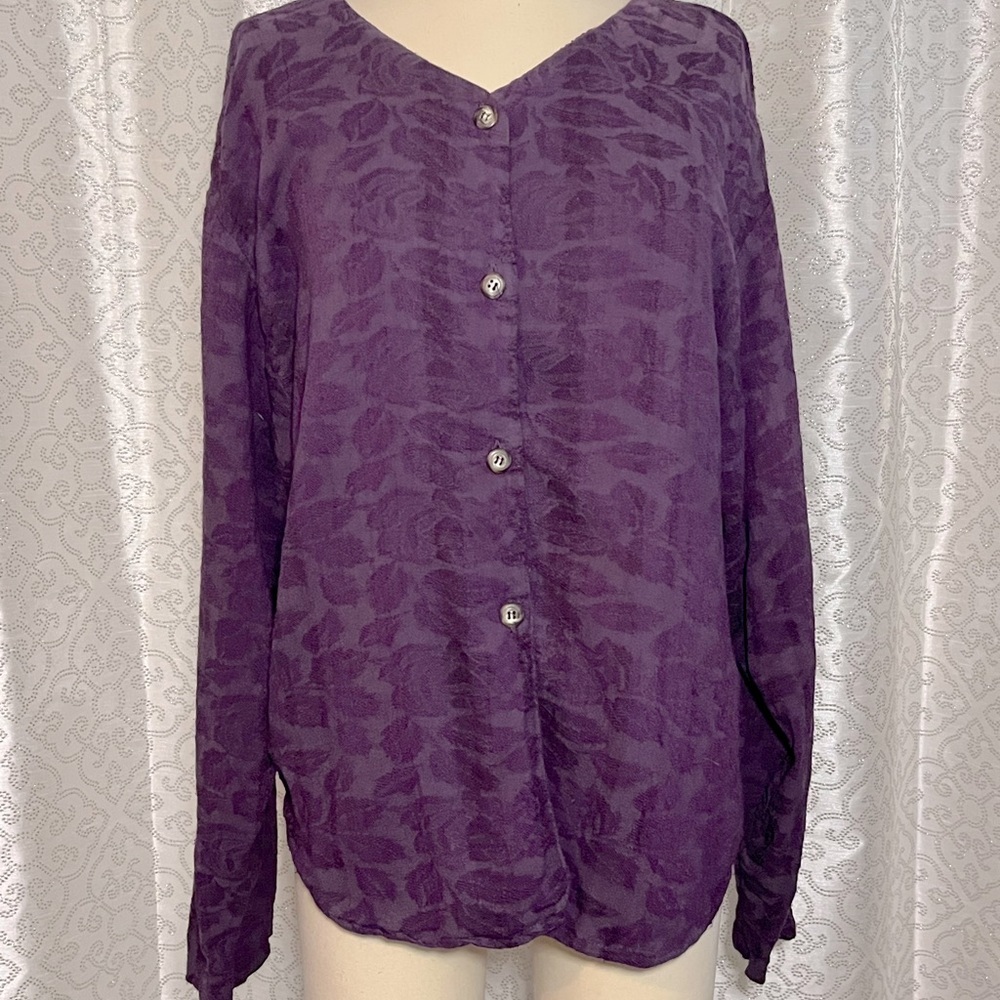 Nomadic Traders purple shirt